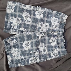 Blue cargo shorts with white Hawaiian flowers